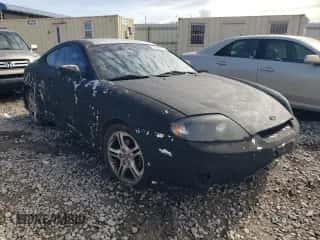 2006 Hyundai Tiburon GT с VIN KMHHN65F86U221847, выставлен на аукционе Copart как лот 42923865 с пробегом 188 494 миль миль и Списание • Salvage title. История ставок и продаж доступна на DreamBid. Изображение 4.