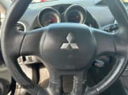 ✅ 2009 Mitsubishi Eclipse GS • VIN: 4A3AK24F49E016000 • Lot: 92322415. Wystawiony na Copart z przebiegiem 129 787 mil. Bezpłatny archiwum sprzedaży aukcyjnych z USA i szczegółowy raport historii pojazdu na DreamBid. Zdjęcie 13.