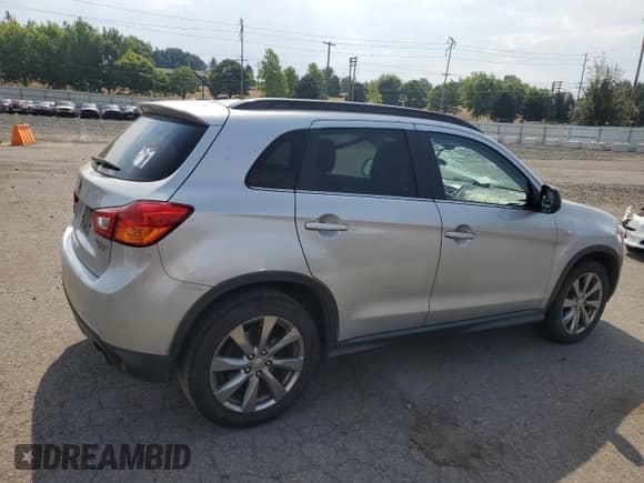 2013 Mitsubishi Outlander LE with VIN 4A4AR5AU1DE022535, listed as a Copart auction lot 70002895 with 297,561 mi miles and Salvage title. Bid and sale history available at DreamBid. Image 3.
