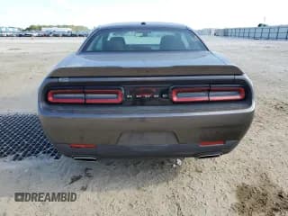 ✅ 2021 Dodge Challenger SXT • VIN: 2C3CDZAGXMH534310 • Lot: 52749184. Wystawiony na Copart z przebiegiem 75 415 mil. Bezpłatny archiwum sprzedaży aukcyjnych z USA i szczegółowy raport historii pojazdu na DreamBid. Zdjęcie 6.