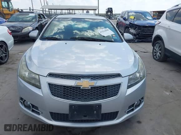 2012 Chevrolet Cruze 1LT z VIN 1G1PF5SC4C7315518, wystawiony jako IAAI lot #43234698 z przebiegiem 123 000 mil mil oraz . Historia ofert i sprzedaży dostępna na DreamBid. Obrazek 12.