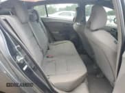 ✅ 2011 Honda Insight • VIN: JHMZE2H38BS003088 • Lot: 63558885. Listed on Copart with 14,396 mi. Free auction sales archive from the USA and detailed vehicle history report at DreamBid. Image 10.