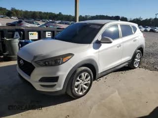 ✅ 2019 Hyundai Tucson SE • VIN: KM8J2CA41KU842290 • Лот: 86243195. Опубликован ранее на Copart с пробегом 122 407 миль. Бесплатный доступ к архиву аукционных продаж из США и подробный отчёт об истории автомобиля на DreamBid. Изображение 1.