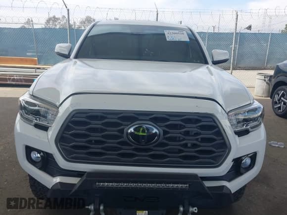 ✅ 2021 Toyota Tacoma SR • VIN: 3TMCZ5AN0MM387565 • Lot: 42300520. Listed on IAAI with 42,153 mi. Free auction sales archive from the USA and detailed vehicle history report at DreamBid. Image 12.