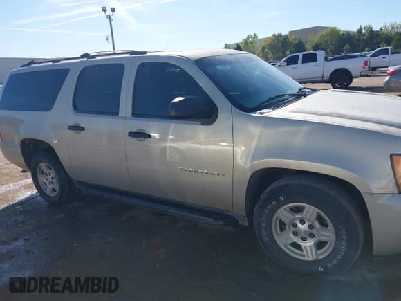 ✅ 2007 Chevrolet Suburban LT • VIN: 3GNFC16J27G294120 • Lot: 43577566. Listed on IAAI with 169,175 mi. Free auction sales archive from the USA and detailed vehicle history report at DreamBid. Image 13.