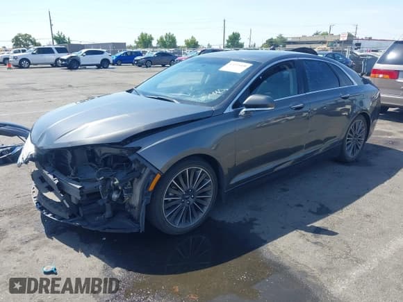 ✅ 2016 Lincoln MKZ Hybrid • VIN: 3LN6L2LU1GR612869 • Lot: 43155400. Listed on IAAI with 161,107 mi. Free auction sales archive from the USA and detailed vehicle history report at DreamBid. Image 2.