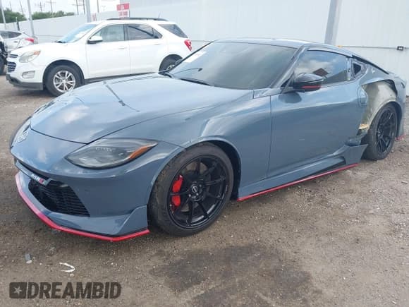 ✅ 2024 Nissan Z Nismo • VIN: JN1BZ4CH7RM360818 • Lot: 42733312. Listed on IAAI with 3,306 mi. Free auction sales archive from the USA and detailed vehicle history report at DreamBid. Image 2.