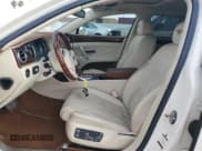 ✅ 2015 Bentley Flying Spur • VIN: SCBEC9ZAXFC041601 • Lot: 62028895. Wystawiony na Copart z przebiegiem 43 943 mil. Bezpłatny archiwum sprzedaży aukcyjnych z USA i szczegółowy raport historii pojazdu na DreamBid. Zdjęcie 7.
