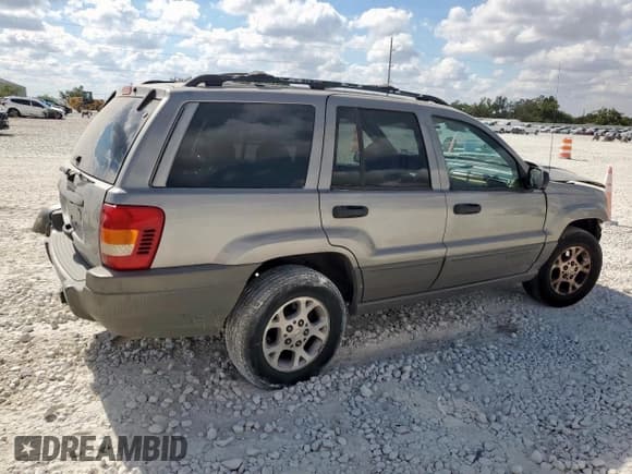 ✅ 2000 Jeep Grand Cherokee Laredo • VIN: 1J4G248S6YC206157 • Lot: 85132095. Listed on Copart with Not provided. Free auction sales archive from the USA and detailed vehicle history report at DreamBid. Image 3.