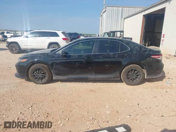 2019 Toyota Camry LE z VIN 4T1B11HK9KU725556, wystawiony jako IAAI lot #42922588 z przebiegiem 138 969 mil mil oraz . Historia ofert i sprzedaży dostępna na DreamBid. Obrazek 14.