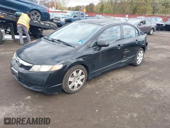 ✅ 2011 Honda Civic LX • VIN: 2HGFA1F56BH546916 • Lot: 43592295. Listed on IAAI with 153,590 mi. Free auction sales archive from the USA and detailed vehicle history report at DreamBid. Image 2.