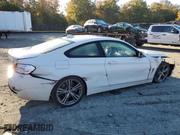 ✅ 2015 BMW 4 Series 428i xDrive • VIN: WBA3N5C56FK198550 • Лот: 82638995. Опубликован ранее на Copart с пробегом 97 041 миль. Бесплатный доступ к архиву аукционных продаж из США и подробный отчёт об истории автомобиля на DreamBid. Изображение 3.