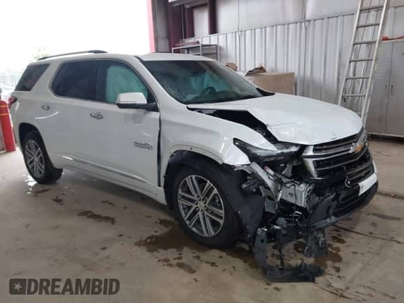 2022 Chevrolet Traverse High Country z VIN 1GNEVNKW6NJ181569, wystawiony jako IAAI lot #43291682 z przebiegiem 25 120 mil mil oraz . Historia ofert i sprzedaży dostępna na DreamBid. Obrazek 1.