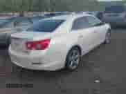 2013 Chevrolet Malibu LTZ with VIN 1G11J5SX5DF223834, listed as a IAAI auction lot 42792315 with 208,506 mi miles and . Bid and sale history available at DreamBid. Image 4.