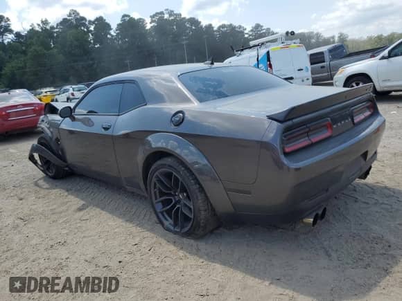 ✅ 2021 Dodge Challenger R/T Scat Pack Widebody • VIN: 2C3CDZFJXMH664561 • Lot: 71657455. Listed on Copart with 44,934 mi. Free auction sales archive from the USA and detailed vehicle history report at DreamBid. Image 2.