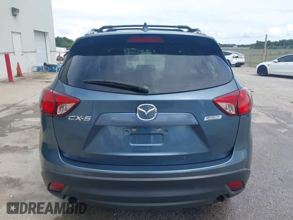 ✅ 2015 Mazda CX-5 Grand Touring • VIN: JM3KE2DY9F0536953 • Lot: 42709042. Wystawiony na IAAI z przebiegiem 129 160 mil. Bezpłatny archiwum sprzedaży aukcyjnych z USA i szczegółowy raport historii pojazdu na DreamBid. Zdjęcie 16.
