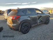 ✅ 2016 Mazda CX-5 Grand Touring • VIN: JM3KE2DY4G0906899 • Lot: 93922385. Wystawiony na Copart z przebiegiem 81 571 mil. Bezpłatny archiwum sprzedaży aukcyjnych z USA i szczegółowy raport historii pojazdu na DreamBid. Zdjęcie 3.