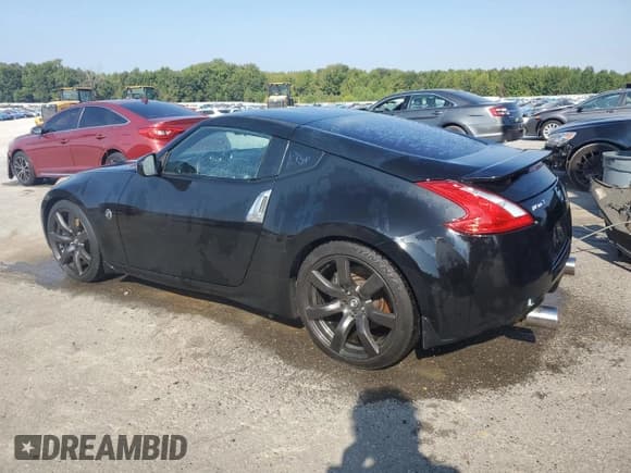 ✅ 2009 Nissan 370Z Touring • VIN: JN1AZ44E09M410801 • Лот: 71891715. Опубликован ранее на Copart с пробегом 155 841 миль. Бесплатный доступ к архиву аукционных продаж из США и подробный отчёт об истории автомобиля на DreamBid. Изображение 2.