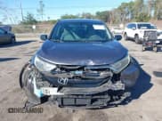 ✅ 2017 Honda CR-V LX • VIN: 7FARW5H39HE013624 • Lot: 43678617. Listed on IAAI with 126,470 mi. Free auction sales archive from the USA and detailed vehicle history report at DreamBid. Image 12.