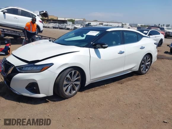 ✅ 2022 Nissan Maxima Platinum • VIN: 1N4AA6FV2NC507985 • Lot: 42960302. Listed on IAAI with 42,882 mi. Free auction sales archive from the USA and detailed vehicle history report at DreamBid. Image 2.