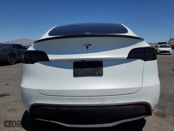 ✅ 2021 Tesla Model Y Standard Range • VIN: 5YJYGDED6MF110950 • Lot: 65652825. Listed on Copart with Not provided. Free auction sales archive from the USA and detailed vehicle history report at DreamBid. Image 6.