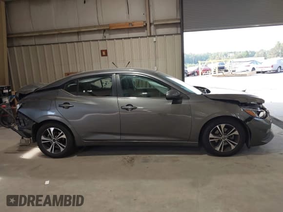 ✅ 2021 Nissan Sentra SV • VIN: 3N1AB8CV8MY303255 • Лот: 43291190. Опубликован ранее на IAAI с пробегом 122 065 миль. Бесплатный доступ к архиву аукционных продаж из США и подробный отчёт об истории автомобиля на DreamBid. Изображение 13.