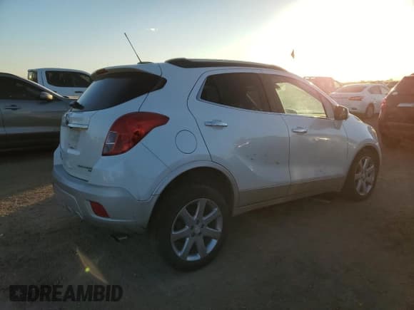 ✅ 2016 Buick Encore Leather • VIN: KL4CJGSB5GB563863 • Lot: 91205875. Listed on Copart with 99,578 mi. Free auction sales archive from the USA and detailed vehicle history report at DreamBid. Image 3.