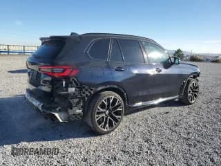 ✅ 2022 BMW X5 M • VIN: 5YMJU0C06N9M19369 • Lot: 83088734. Listed on Copart with 35,382 mi. Free auction sales archive from the USA and detailed vehicle history report at DreamBid. Image 3.