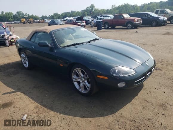 ✅ 2003 Jaguar XK • VIN: SAJDA42C532A36020 • Lot: 60656805. Wystawiony na Copart z przebiegiem 65 020 mil. Bezpłatny archiwum sprzedaży aukcyjnych z USA i szczegółowy raport historii pojazdu na DreamBid. Zdjęcie 4.