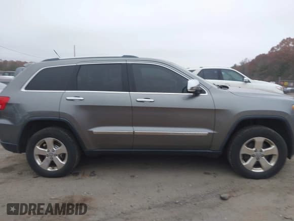 ✅ 2012 Jeep Grand Cherokee Limited • VIN: 1C4RJFBG5CC340605 • Лот: 43772508. Опубликован ранее на IAAI с пробегом 210 295 миль. Бесплатный доступ к архиву аукционных продаж из США и подробный отчёт об истории автомобиля на DreamBid. Изображение 13.