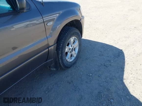 2006 Mercury Mariner Luxury с VIN 4M2CU57116KJ19454, выставлен на аукционе IAAI как лот 42436725 с пробегом 244 689 миль миль и . История ставок и продаж доступна на DreamBid. Изображение 15.