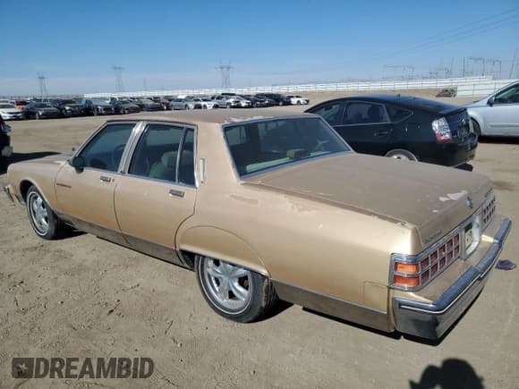 ✅ 1986 Pontiac Parisienne • VIN: 1G2BT69Y2GX267691 • Lot: 79337604. Listed on Copart with 55,458 mi. Free auction sales archive from the USA and detailed vehicle history report at DreamBid. Image 2.