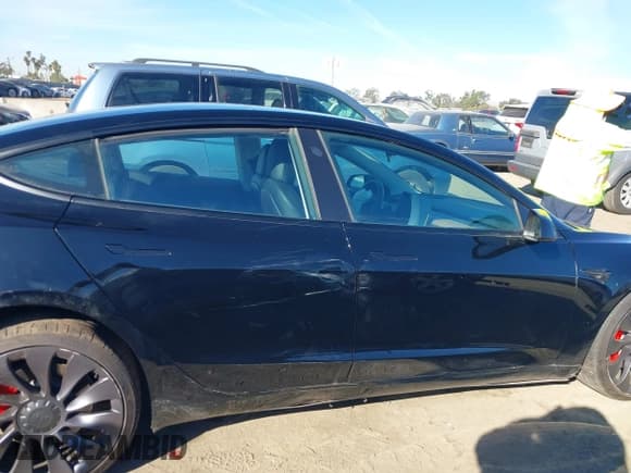 ✅ 2021 Tesla Model 3 Performance • VIN: 5YJ3E1EC6MF999321 • Lot: 41417451. Wystawiony na IAAI z przebiegiem 20 562 mil. Bezpłatny archiwum sprzedaży aukcyjnych z USA i szczegółowy raport historii pojazdu na DreamBid. Zdjęcie 13.