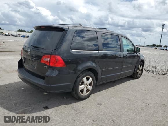 ✅ 2011 Volkswagen Routan SE • VIN: 2V4RW3DG7BR642017 • Лот: 71566555. Опубликован ранее на Copart с пробегом 143 454 миль. Бесплатный доступ к архиву аукционных продаж из США и подробный отчёт об истории автомобиля на DreamBid. Изображение 3.