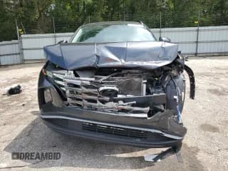 ✅ 2022 Hyundai Tucson SEL • VIN: 5NMJC3AE6NH119556 • Lot: 67500654. Wystawiony na Copart z przebiegiem 27 989 mil. Bezpłatny archiwum sprzedaży aukcyjnych z USA i szczegółowy raport historii pojazdu na DreamBid. Zdjęcie 5.