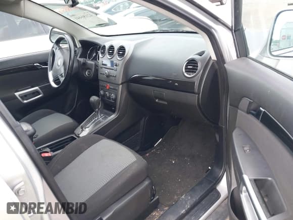 ✅ 2013 Chevrolet Captiva Sport LS • VIN: 3GNAL2EKXDS606686 • Lot: 42186441. Wystawiony na IAAI z przebiegiem 129 815 mil. Bezpłatny archiwum sprzedaży aukcyjnych z USA i szczegółowy raport historii pojazdu na DreamBid. Zdjęcie 5.