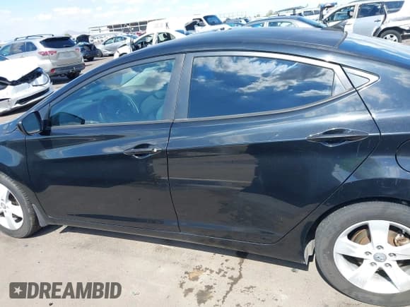 ✅ 2013 Hyundai Elantra GLS • VIN: 5NPDH4AE1DH170792 • Lot: 42393330. Listed on IAAI with 159,813 mi. Free auction sales archive from the USA and detailed vehicle history report at DreamBid. Image 14.