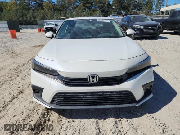 ✅ 2022 Honda Civic Touring • VIN: 2HGFE1F93NH307951 • Лот: 82345935. Опубликован ранее на Copart с пробегом 61 323 миль. Бесплатный доступ к архиву аукционных продаж из США и подробный отчёт об истории автомобиля на DreamBid. Изображение 5.