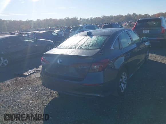 ✅ 2025 Honda Civic LX • VIN: 2HGFE2F21SH506677 • Lot: 43492570. Listed on IAAI with 49,571 mi. Free auction sales archive from the USA and detailed vehicle history report at DreamBid. Image 4.