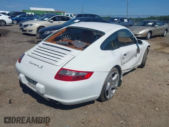 ✅ 2007 Porsche 911 Carrera S • VIN: WP0AB299X7S732114 • Lot: 42453230. Listed on IAAI with 111,542 mi. Free auction sales archive from the USA and detailed vehicle history report at DreamBid. Image 4.