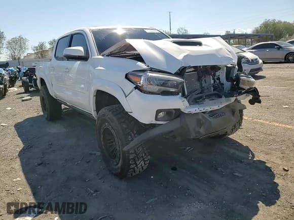 ✅ 2023 Toyota Tacoma SR • VIN: 3TMCZ5AN8PM642564 • Lot: 80309685. Listed on Copart with 13,957 mi. Free auction sales archive from the USA and detailed vehicle history report at DreamBid. Image 14.