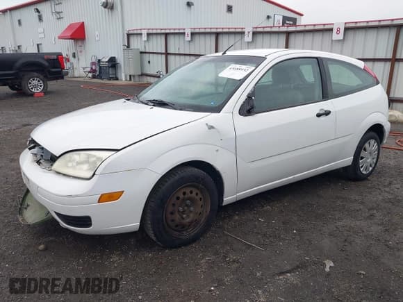 ✅ 2007 Ford Focus S • VIN: 1FAFP31N27W187658 • Лот: 43688932. Опубликован ранее на IAAI с пробегом 140 912 миль. Бесплатный доступ к архиву аукционных продаж из США и подробный отчёт об истории автомобиля на DreamBid. Изображение 2.