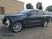 ✅ 2013 Dodge Durango R/T • VIN: 1C4SDJCT7DC696014 • Lot: 65469375. Listed on Copart with 123,656 mi. Free auction sales archive from the USA and detailed vehicle history report at DreamBid. Image 1.