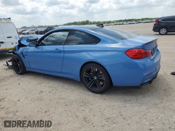 ✅ 2015 BMW M4 • VIN: WBS3R9C59FK335424 • Lot: 56173675. Listed on Copart with 114,999 mi. Free auction sales archive from the USA and detailed vehicle history report at DreamBid. Image 2.