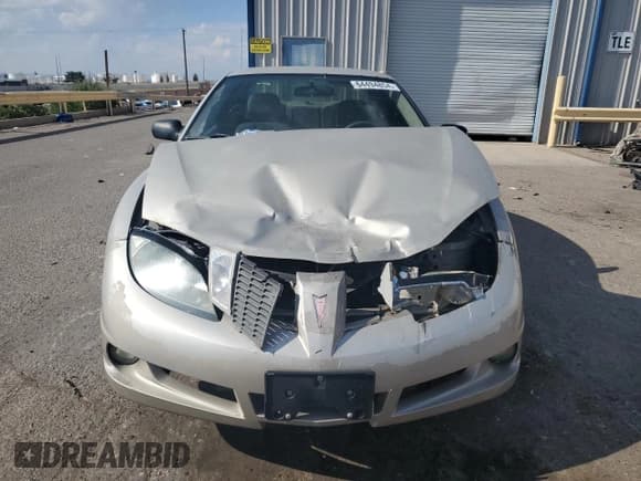 ✅ 2003 Pontiac Sunfire • VIN: 1G2JB12F837289781 • Lot: 64494854. Wystawiony na Copart z przebiegiem Nie podano. Bezpłatny archiwum sprzedaży aukcyjnych z USA i szczegółowy raport historii pojazdu na DreamBid. Zdjęcie 5.