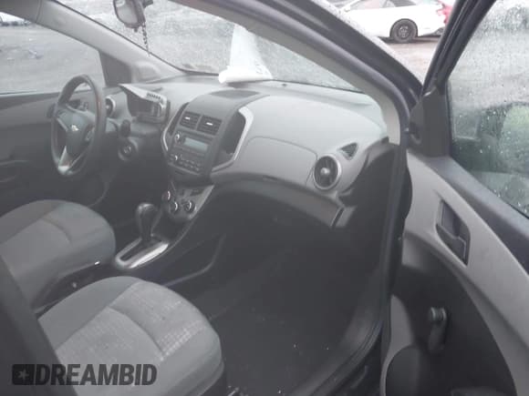 ✅ 2016 Chevrolet Sonic LS • VIN: 1G1JA5SG4G4172813 • Lot: 43608147. Listed on IAAI with 74,048 mi. Free auction sales archive from the USA and detailed vehicle history report at DreamBid. Image 5.