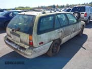 ✅ 1996 Ford Escort LX • VIN: 1FASP15J6TW156952 • Lot: 41953279. Wystawiony na IAAI z przebiegiem 141 145 mil. Bezpłatny archiwum sprzedaży aukcyjnych z USA i szczegółowy raport historii pojazdu na DreamBid. Zdjęcie 4.