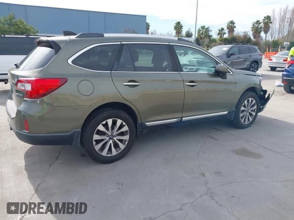 ✅ 2017 Subaru Outback Touring • VIN: 4S4BSETCXH3371887 • Lot: 41692515. Listed on IAAI with 57,039 mi. Free auction sales archive from the USA and detailed vehicle history report at DreamBid. Image 4.