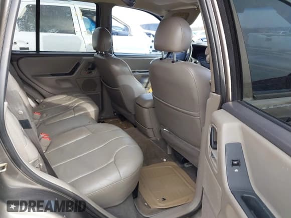 ✅ 1999 Jeep Grand Cherokee Laredo • VIN: 1J4G258S8XC650533 • Lot: 41583331. Wystawiony na IAAI z przebiegiem 245 164 mil. Bezpłatny archiwum sprzedaży aukcyjnych z USA i szczegółowy raport historii pojazdu na DreamBid. Zdjęcie 8.