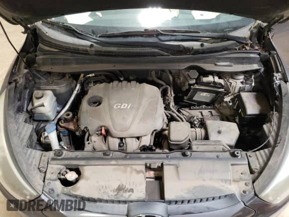 2015 Hyundai Tucson SE z VIN KM8JU3AG1FU973407, wystawiony jako Copart lot #59017604 z przebiegiem Nie podano mil oraz Szkoda całkowita • Salvage title. Historia ofert i sprzedaży dostępna na DreamBid. Obrazek 12.